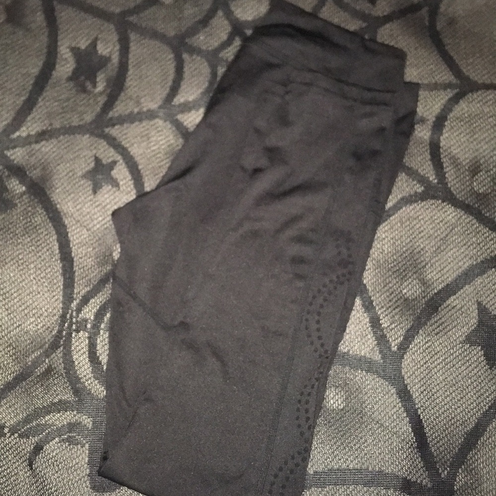 Black leggings with design cut out on legs
